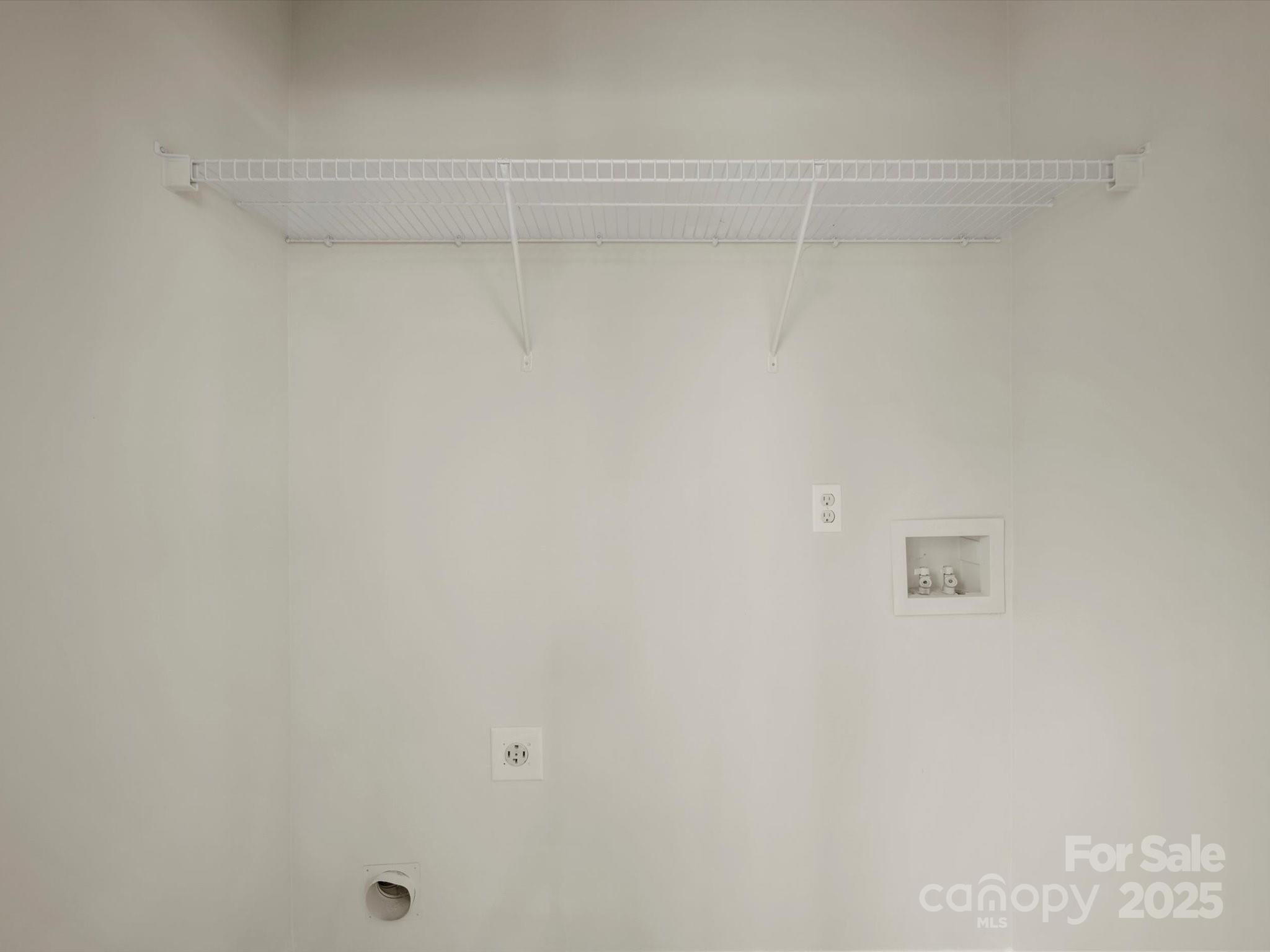 6420 Sunman Road Charlotte, NC 28216 - Photo 15 of 43 a view of a rack on the wall