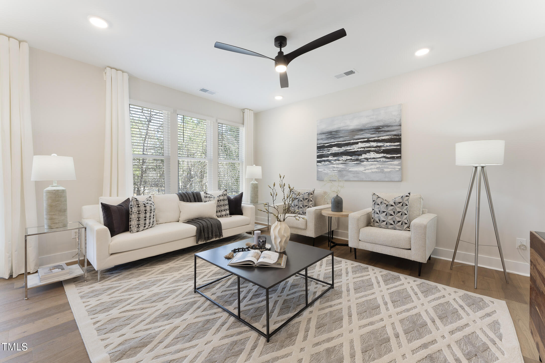 604 Whistable Avenue Wake Forest, NC 27587 - Photo 15 of 44 a living room with furniture and a large window