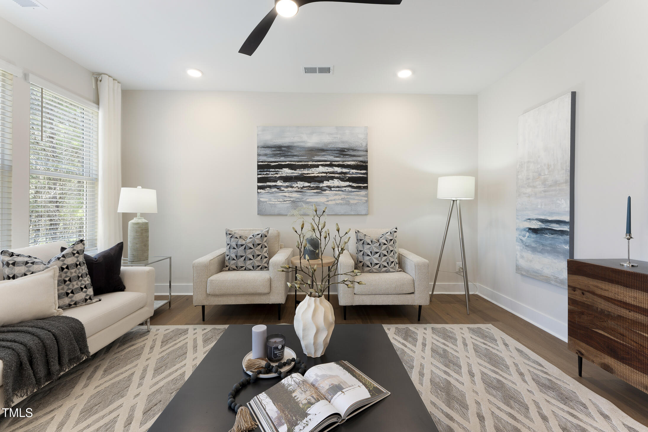604 Whistable Avenue Wake Forest, NC 27587 - Photo 17 of 44 a living room with furniture and wooden floor