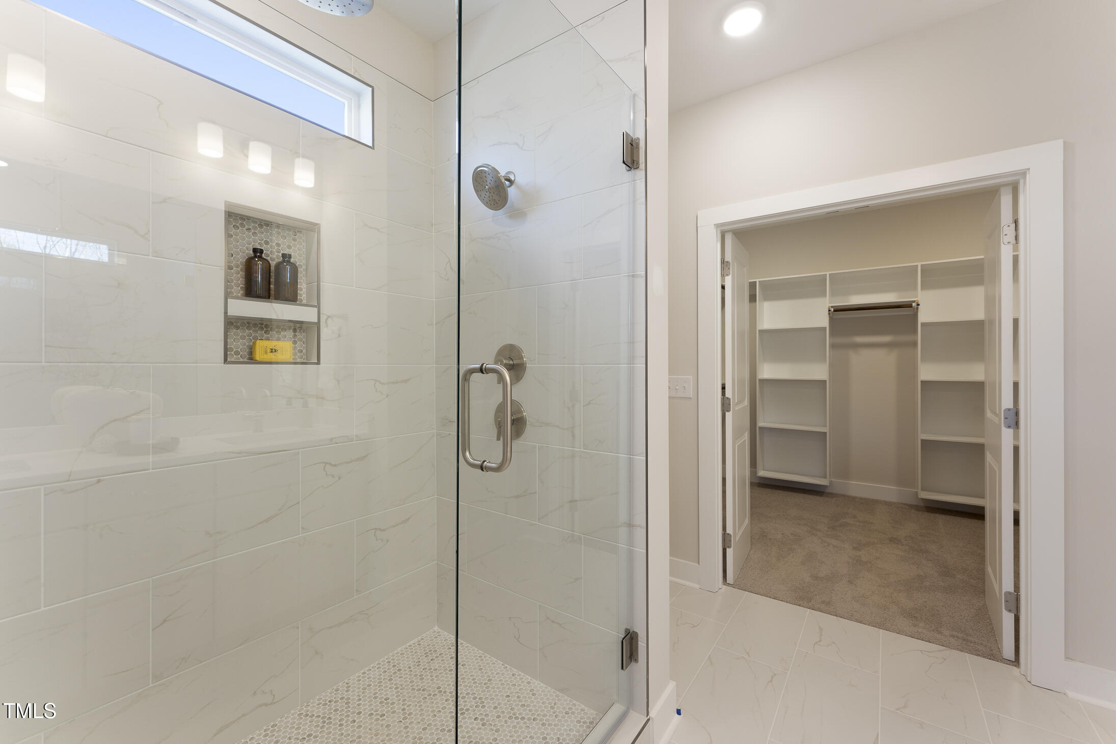 604 Whistable Avenue Wake Forest, NC 27587 - Photo 27 of 44 a bathroom with a shower
