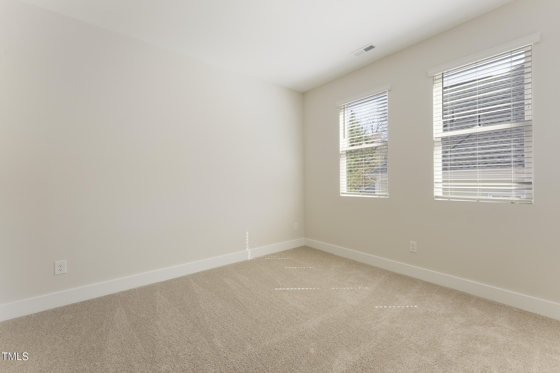 604 Whistable Avenue Wake Forest, NC 27587 - Photo 39 of 44 an empty room with a window