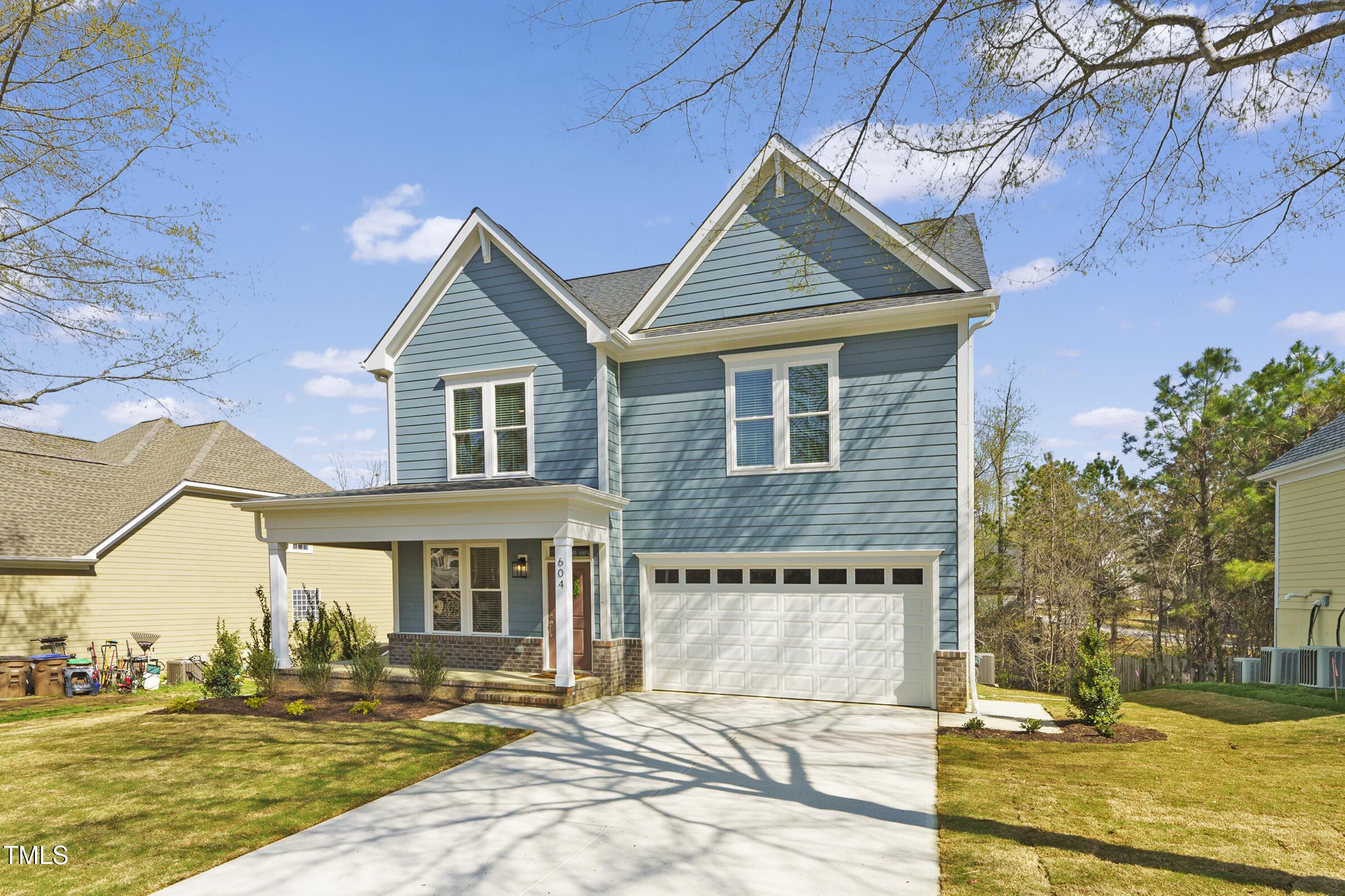 604 Whistable Avenue Wake Forest, NC 27587 - Photo 4 of 44 a front view of a house with a yard
