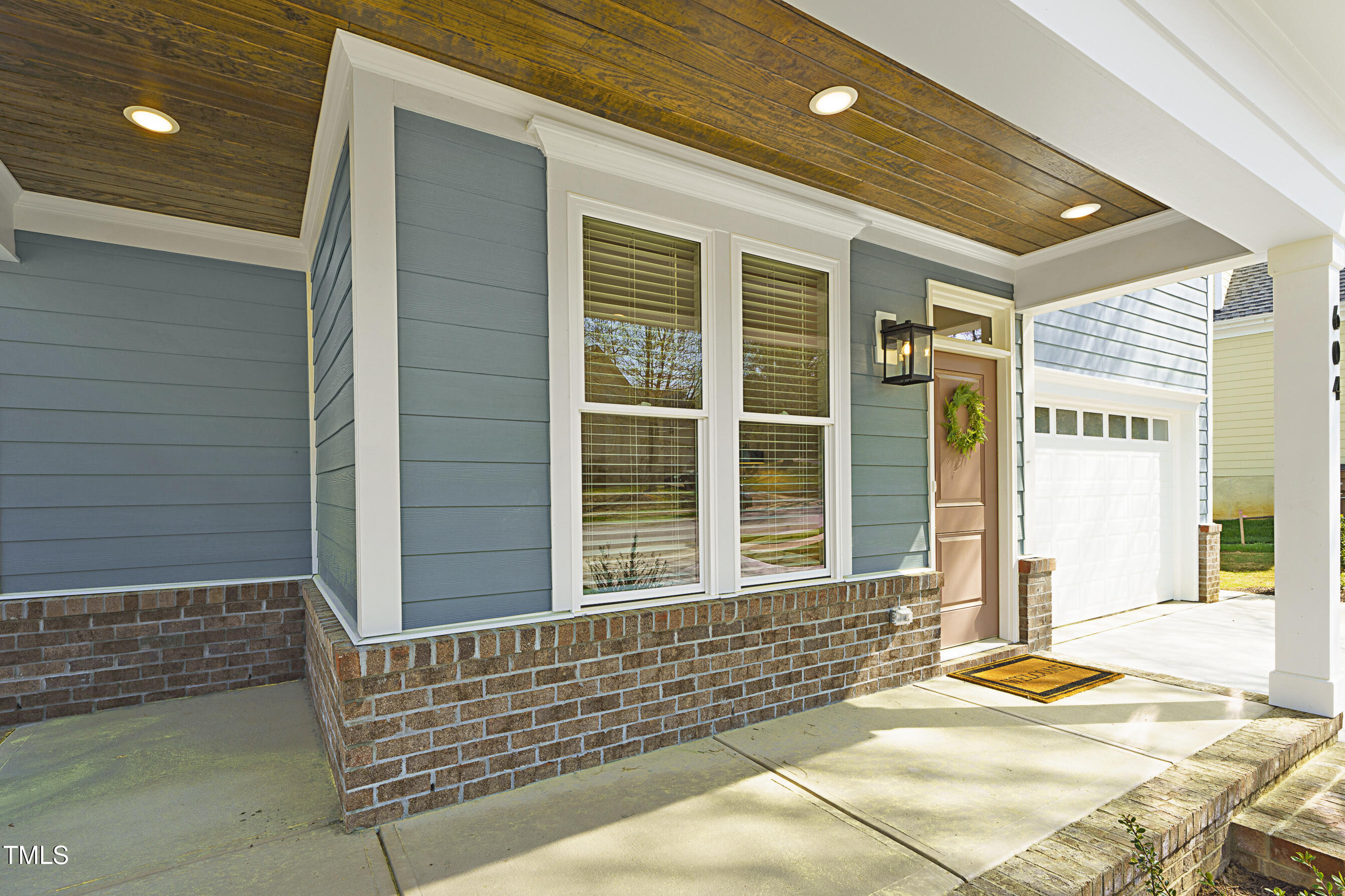 604 Whistable Avenue Wake Forest, NC 27587 - Photo 5 of 44 a view of a balcony with a lounge chair