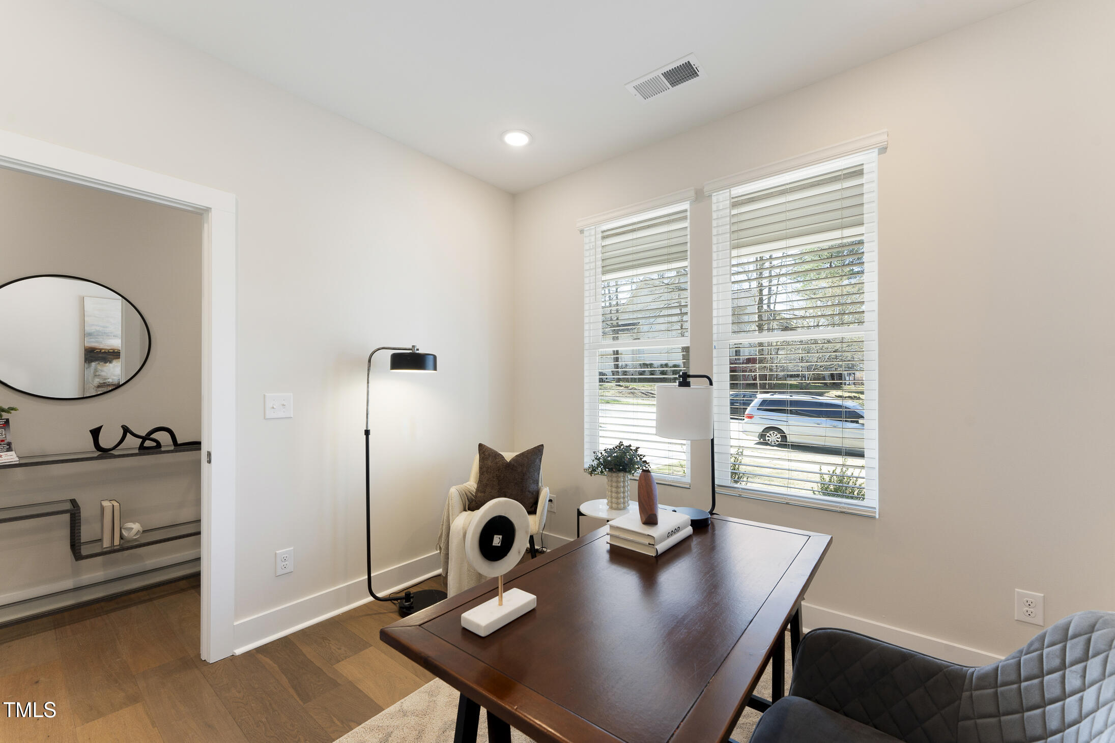 604 Whistable Avenue Wake Forest, NC 27587 - Photo 7 of 44 a view of a workspace with furniture and a window