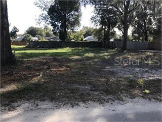 Powell Street Wildwood, FL 34785 - Photo 1 of 1 a view of backyard with green space