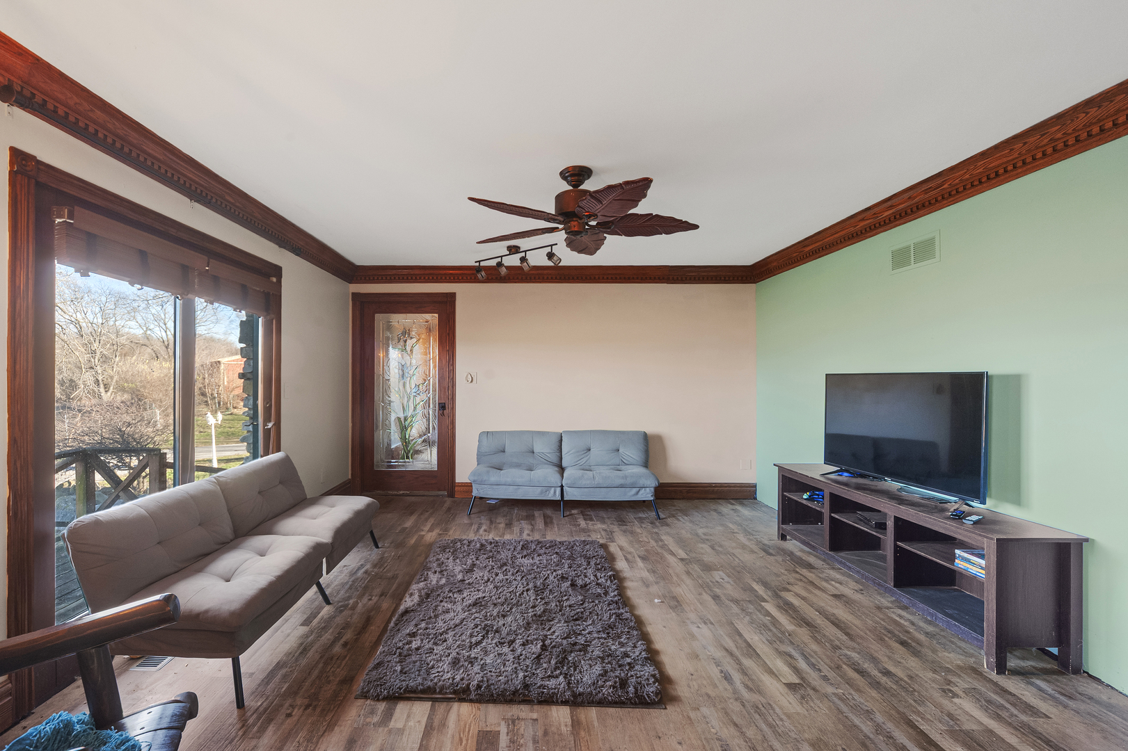 28766 West Burnett Road McHenry, IL 60051 - Photo 11 of 19 a living room with furniture and a flat screen tv