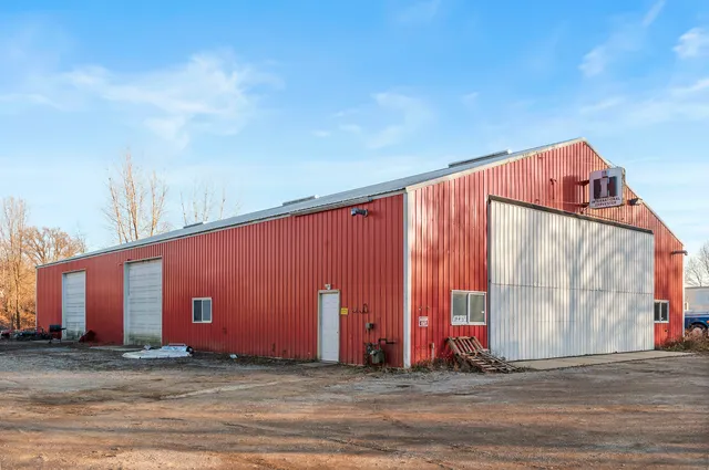 a view of an empty room with a large window