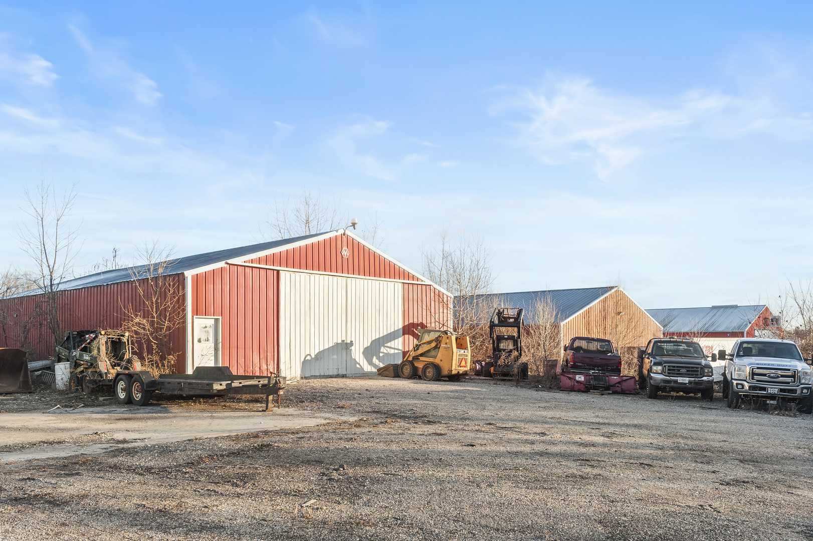 28766 West Burnett Road McHenry, IL 60051 - Photo 17 of 19 a view of a house with many windows and a table