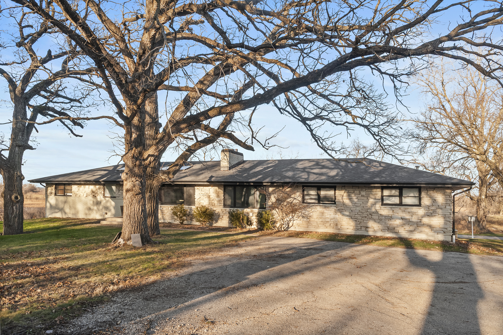28766 West Burnett Road McHenry, IL 60051 - Photo 2 of 19 a view of a yard with a tree