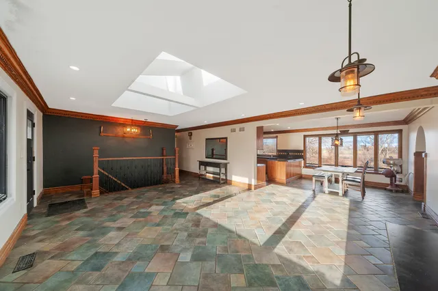 a view of a livingroom with furniture and window