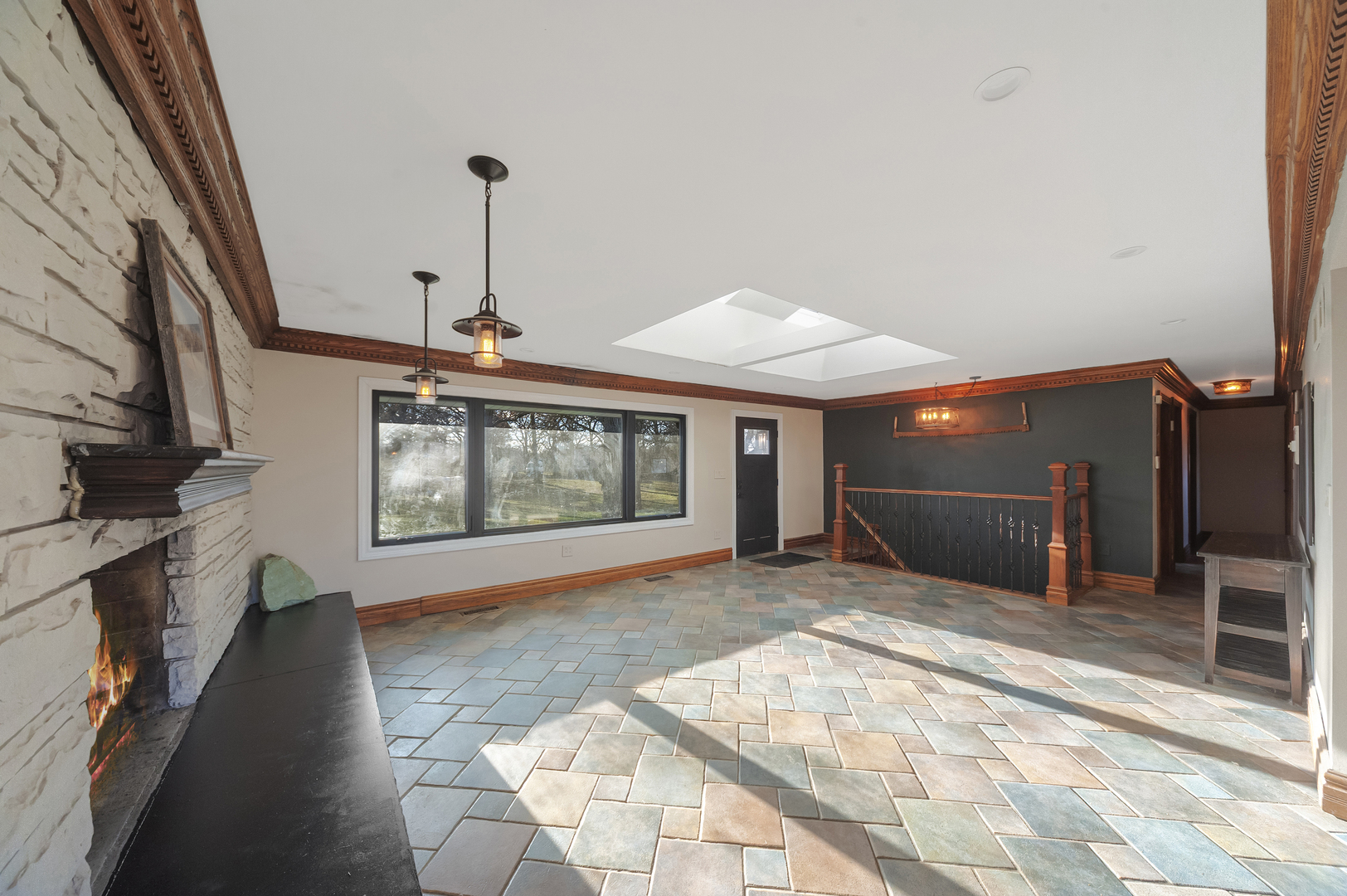 28766 West Burnett Road McHenry, IL 60051 - Photo 7 of 19 a view of a porch with furniture and floor to ceiling window