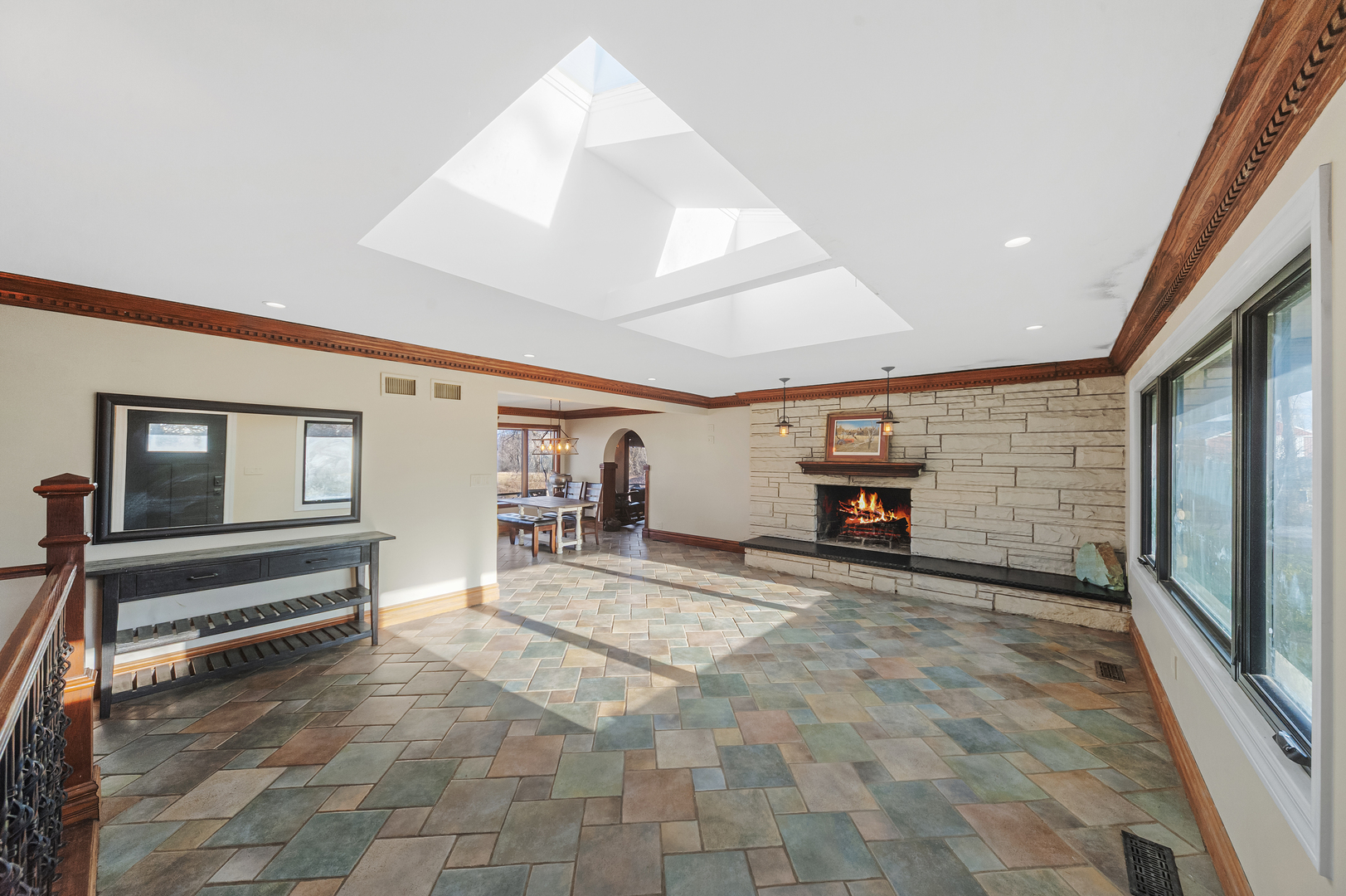 28766 West Burnett Road McHenry, IL 60051 - Photo 8 of 19 a view of a livingroom with entryway and fireplace