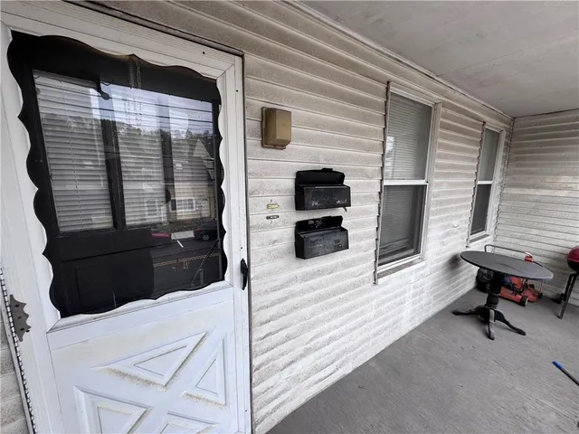 a view of a livingroom with furniture