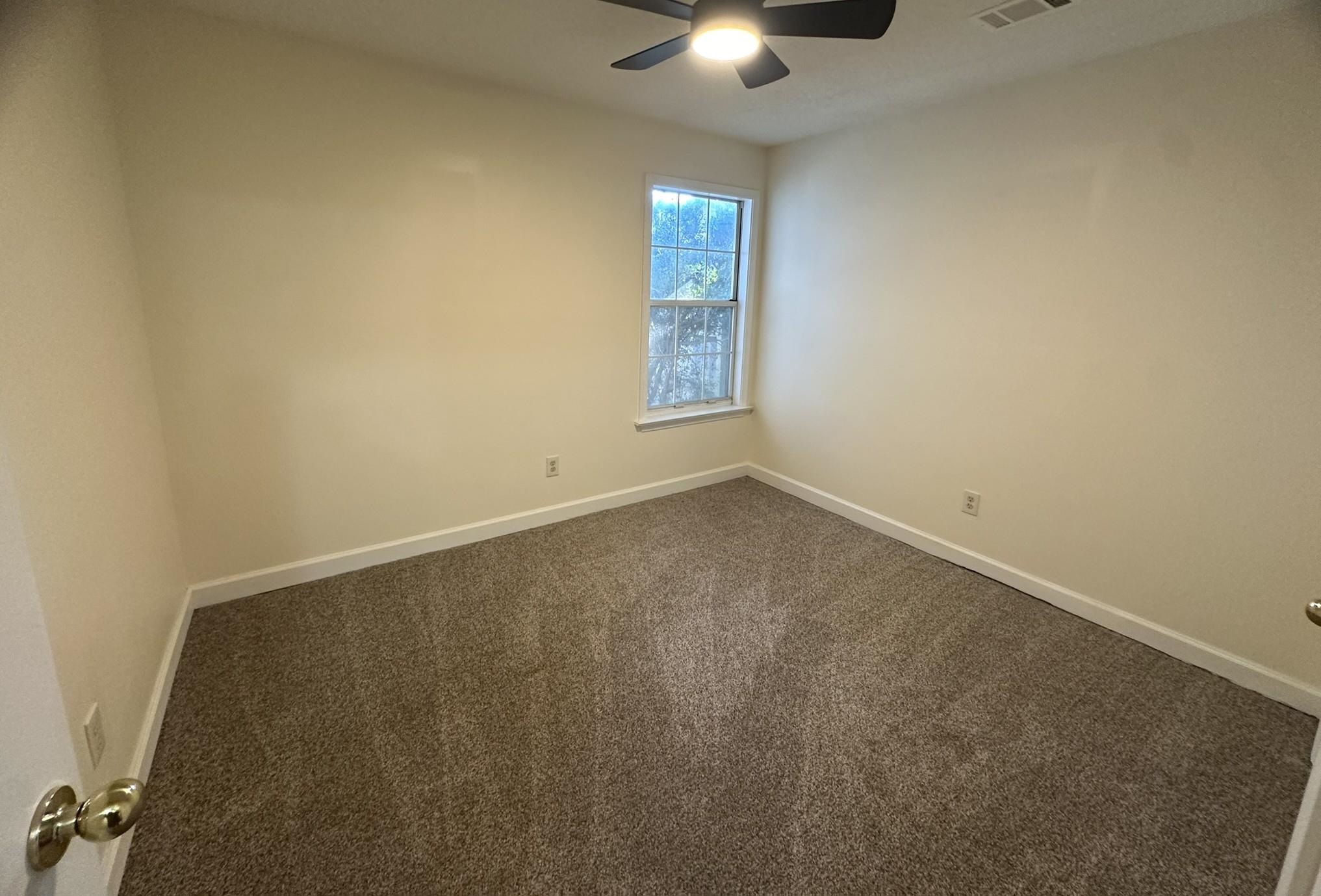 5435 Pine Oak Lane Bartlett, TN 38135 - Photo 7 of 17 an empty room with a window