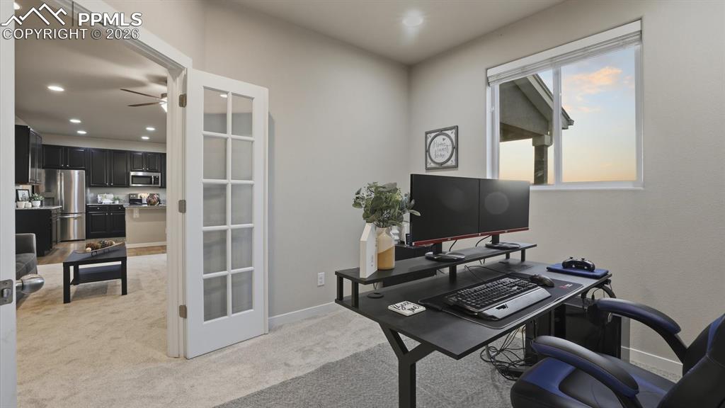 7872 Callendale Drive Colorado Springs, CO 80908 - Photo 11 of 50 View into the Living Room and Kitchen from the Office.