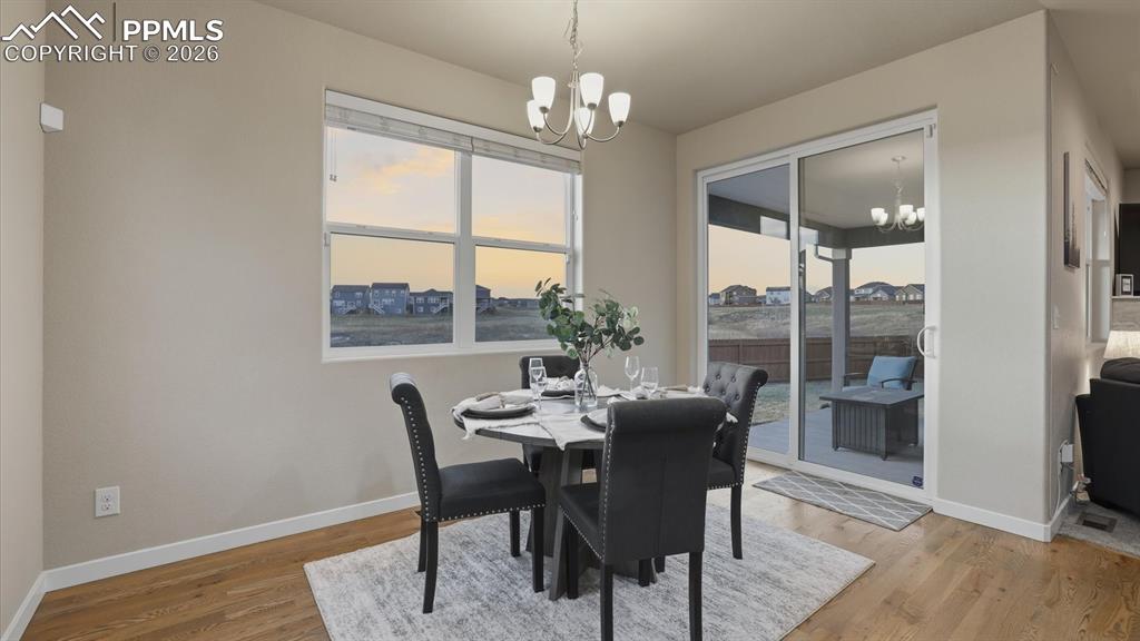7872 Callendale Drive Colorado Springs, CO 80908 - Photo 14 of 50 The Dining Area has a slider to a covered backyard patio.