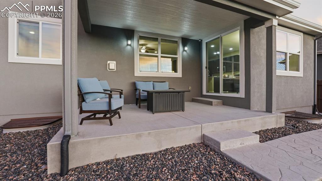 7872 Callendale Drive Colorado Springs, CO 80908 - Photo 15 of 50 Covered backyard patio for outdoor dining and relaxation.