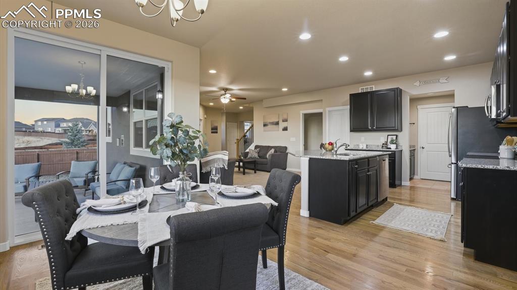 7872 Callendale Drive Colorado Springs, CO 80908 - Photo 17 of 50 View of the Dining Area, Kitchen, and Living Room.