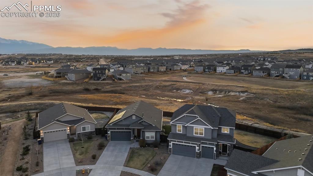 7872 Callendale Drive Colorado Springs, CO 80908 - Photo 2 of 50 View of home and open space with walking trails behind the home.