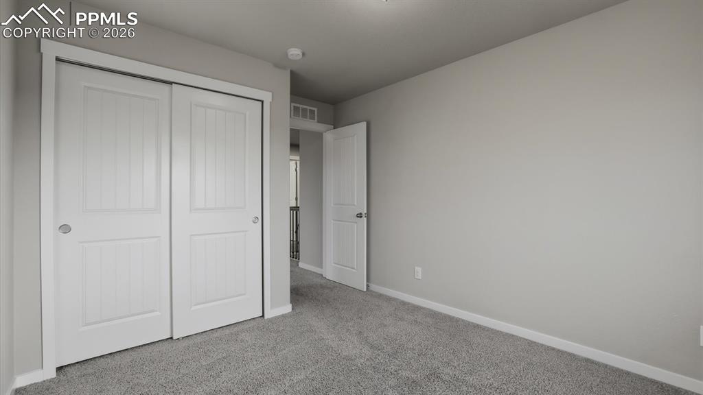 7872 Callendale Drive Colorado Springs, CO 80908 - Photo 37 of 50 Upper Level Bedroom #4 has a generous closet.
