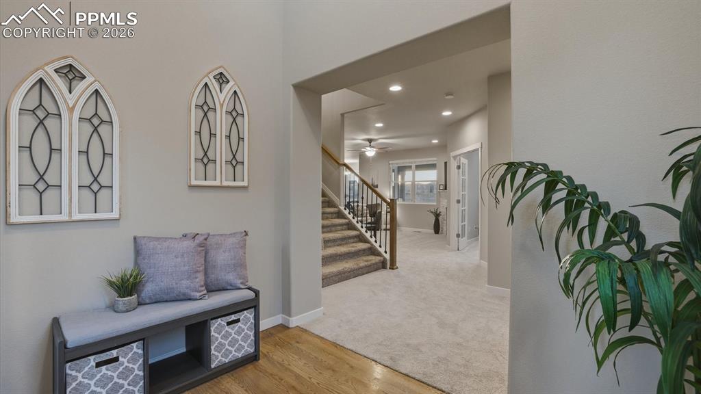 7872 Callendale Drive Colorado Springs, CO 80908 - Photo 6 of 50 Interior Entry with iron rails to the upper level.