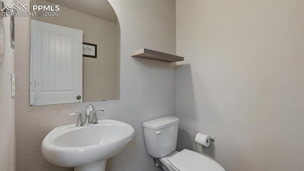 7872 Callendale Drive Colorado Springs, CO 80908 - Photo 8 of 50 Convenient Powder Bathroom.