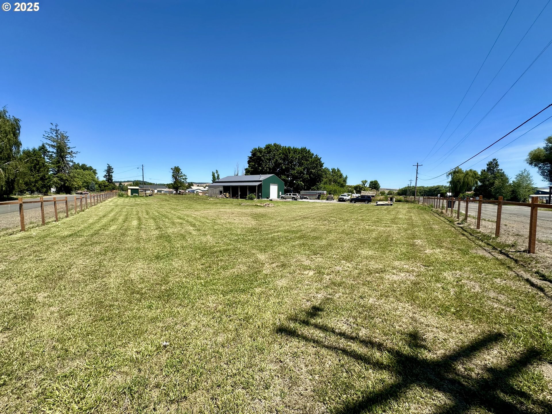 a view of yard with swimming pool and outdoor seating