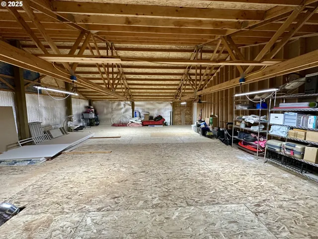 a view of parking garage with cars