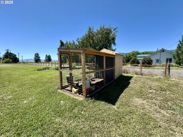 a view of a porch with a yard