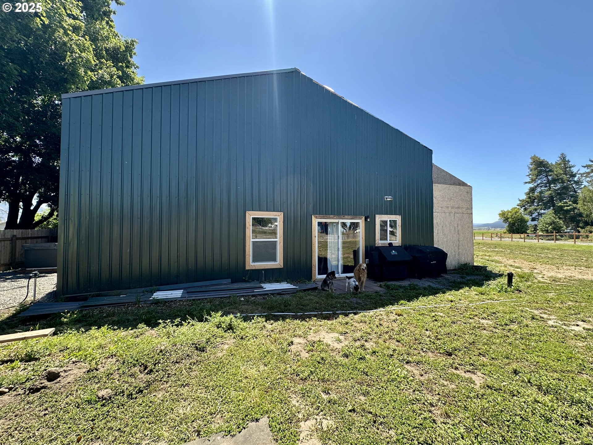 416 4th Street Summerville, OR 97876 - Photo 34 of 40 a front view of house with yard and trees