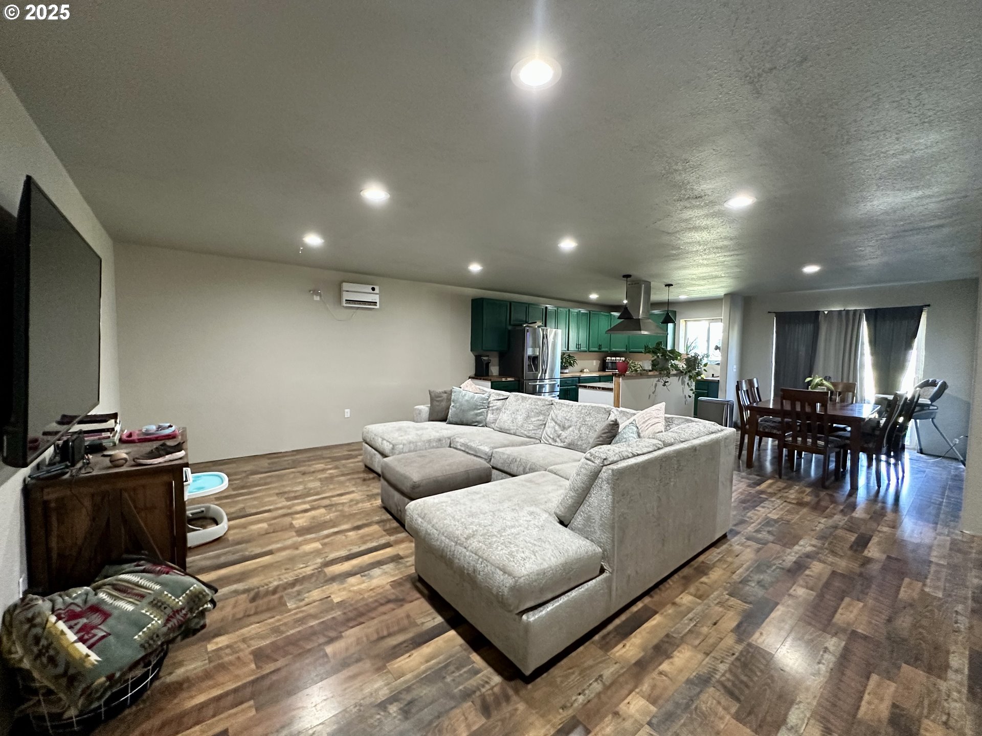 416 4th Street Summerville, OR 97876 - Photo 9 of 40 a living room with furniture and a flat screen tv