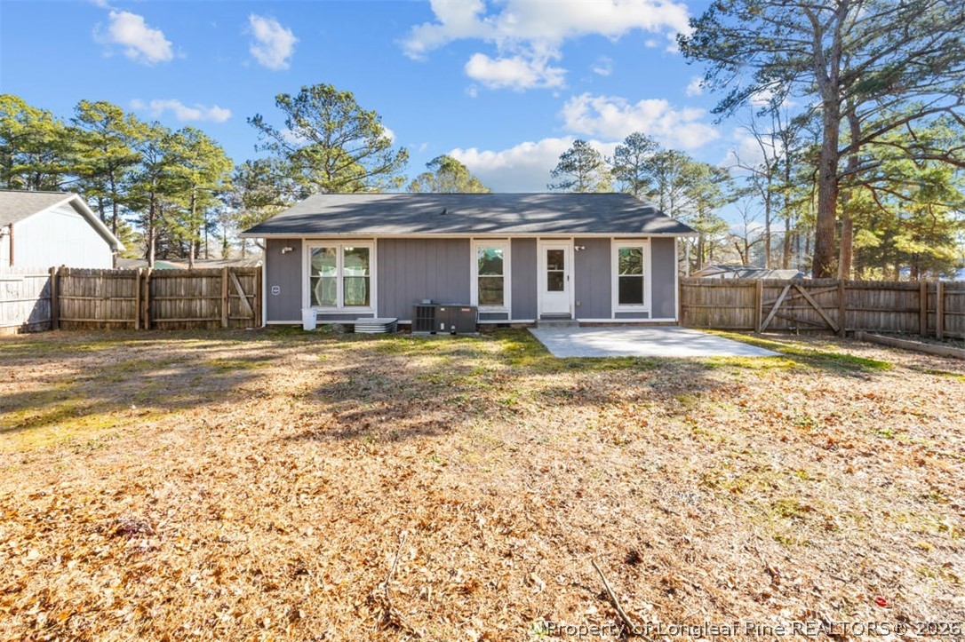 3305 Hunting Bay Drive Spring Lake, NC 28390 - Photo 21 of 27 a view of a house with a yard