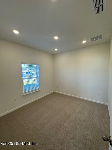 156 Camphor Laurel Road St. Augustine, FL 32092 - Photo 14 of 34 an empty room with a empty space and windows