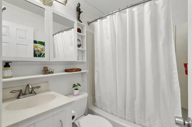 a bedroom with a bed and a closet