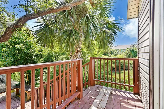 a view of a backyard with a bench