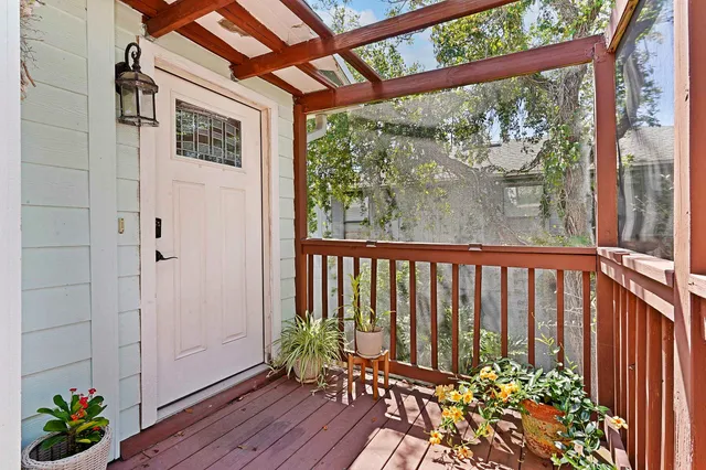 a view of a chairs and table in a patio