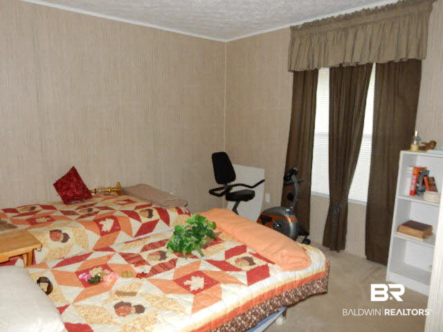 580 Escambia Loop Lillian, AL 36549 - Photo 15 of 16 3rd bedroom