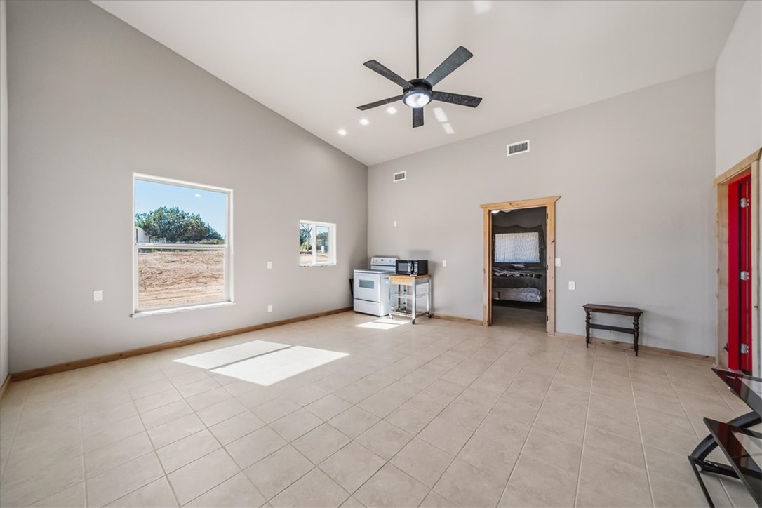 10374 East Happy Trails Road Kingman, AZ 86401 - Photo 26 of 68 a view of a livingroom with a workspace