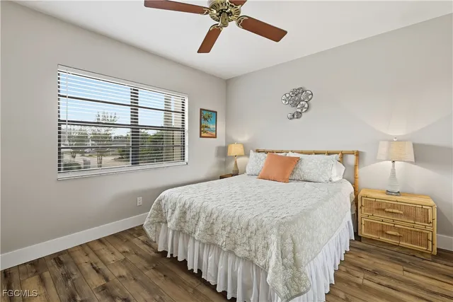 a bedroom with bed and window