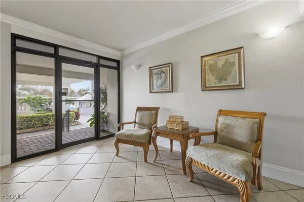 a bedroom with furniture and a gate