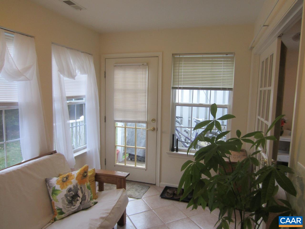 1420 Lilac Court Charlottesville, VA 22901 - Photo 13 of 15 a living room with furniture and a large window