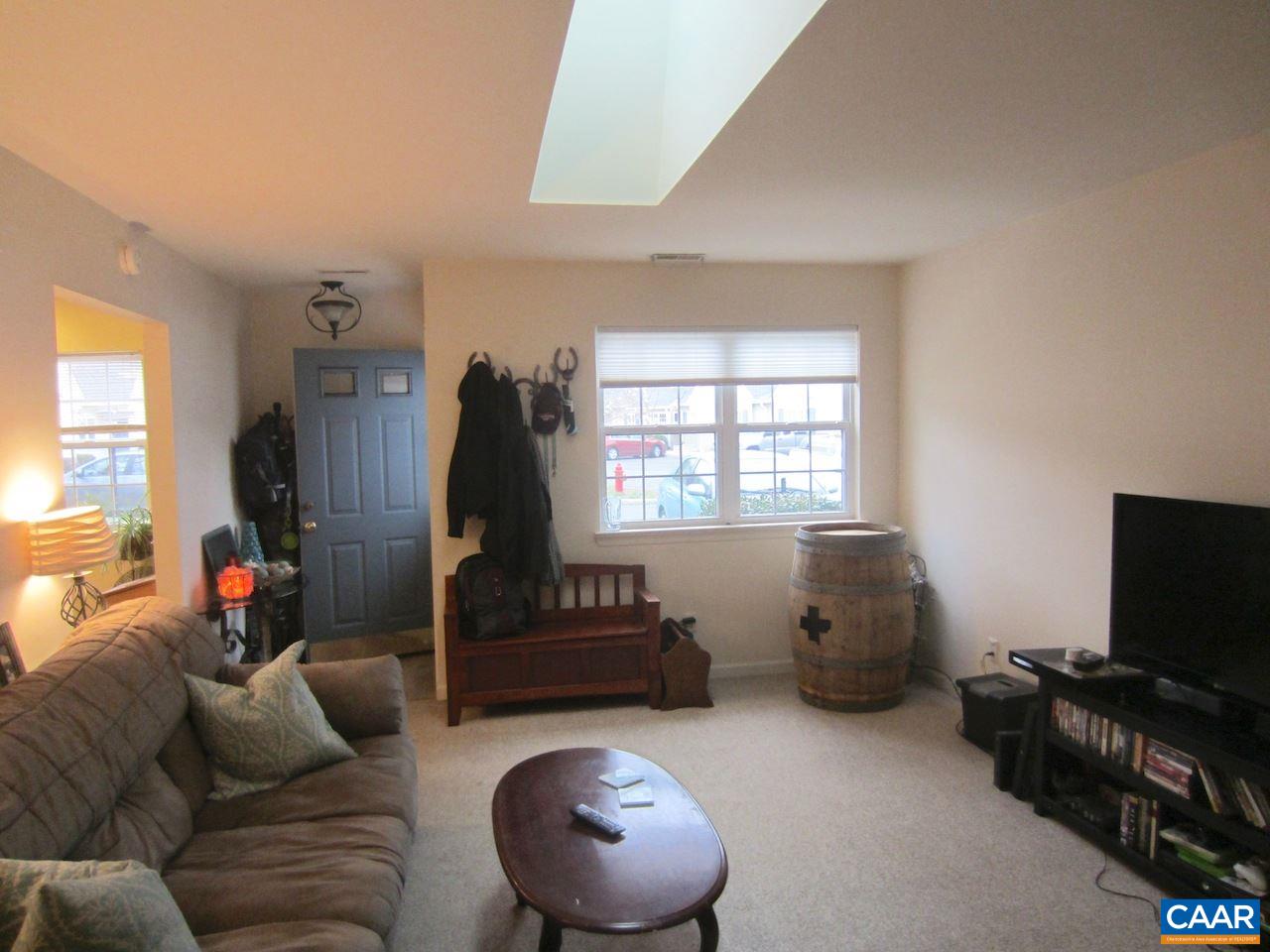 1420 Lilac Court Charlottesville, VA 22901 - Photo 3 of 15 a living room with furniture and a flat screen tv