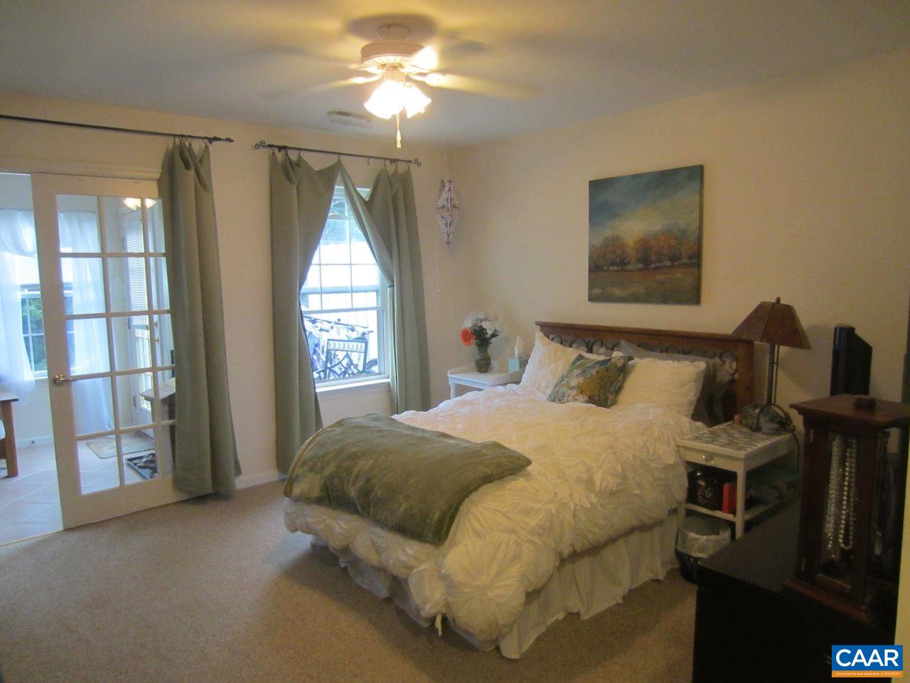 1420 Lilac Court Charlottesville, VA 22901 - Photo 6 of 15 a bedroom with a bed and a window