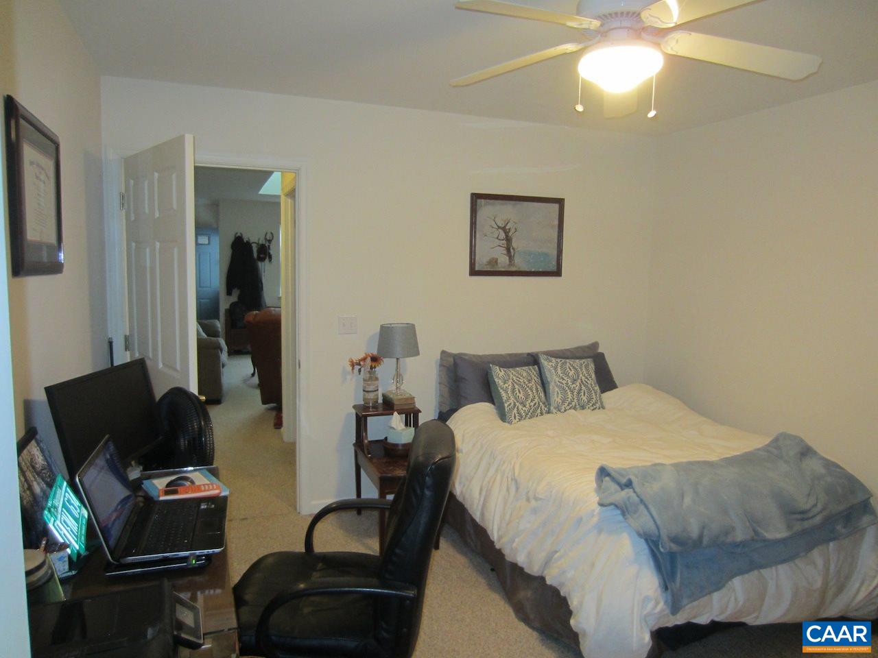 1420 Lilac Court Charlottesville, VA 22901 - Photo 10 of 15 a bedroom with a bed and furniture