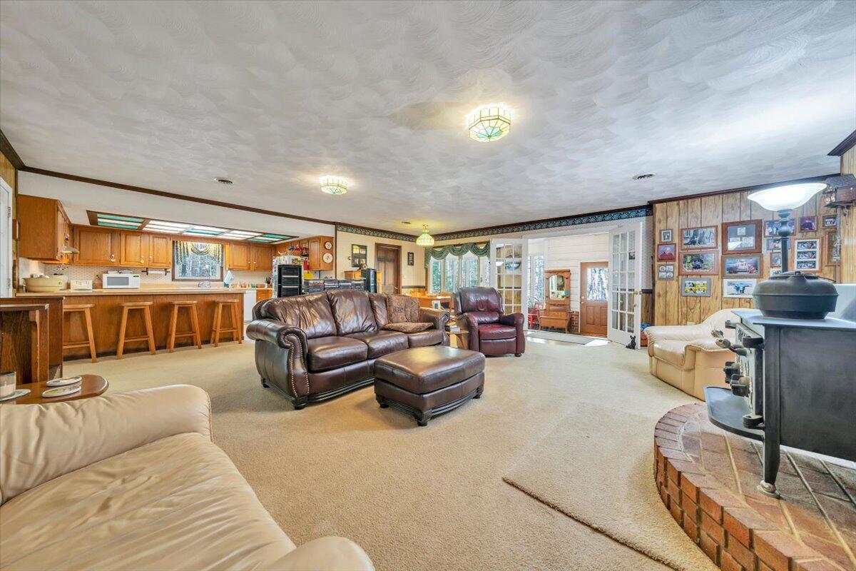 3878 Harborwood Road Salem, VA 24153 - Photo 13 of 60 a living room with furniture and a flat screen tv