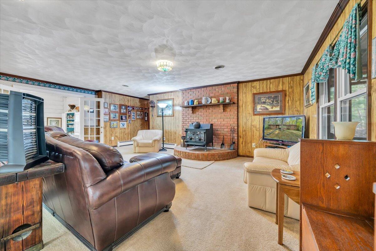 3878 Harborwood Road Salem, VA 24153 - Photo 14 of 60 a living room with furniture and a flat screen tv