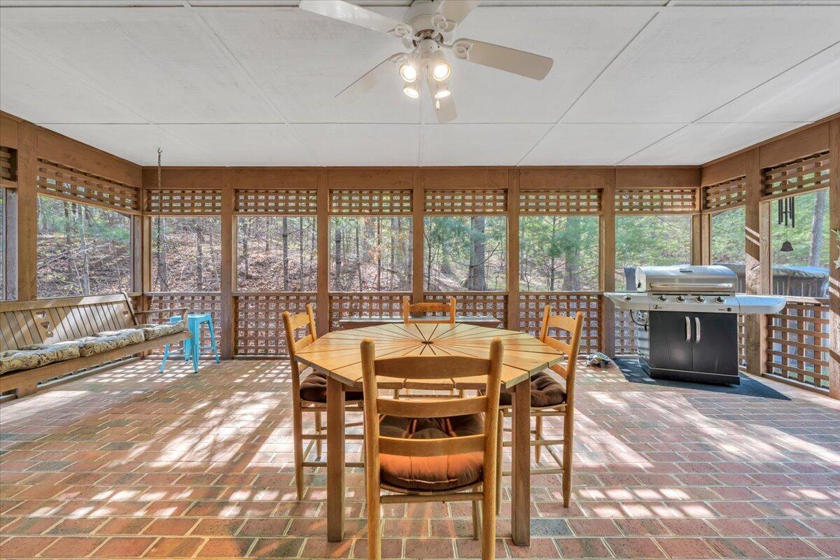 3878 Harborwood Road Salem, VA 24153 - Photo 25 of 60 a dining room with furniture and a floor to ceiling window