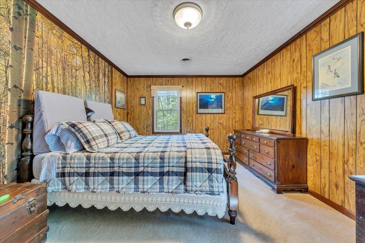 3878 Harborwood Road Salem, VA 24153 - Photo 28 of 60 a bedroom with a bed and wooden floor