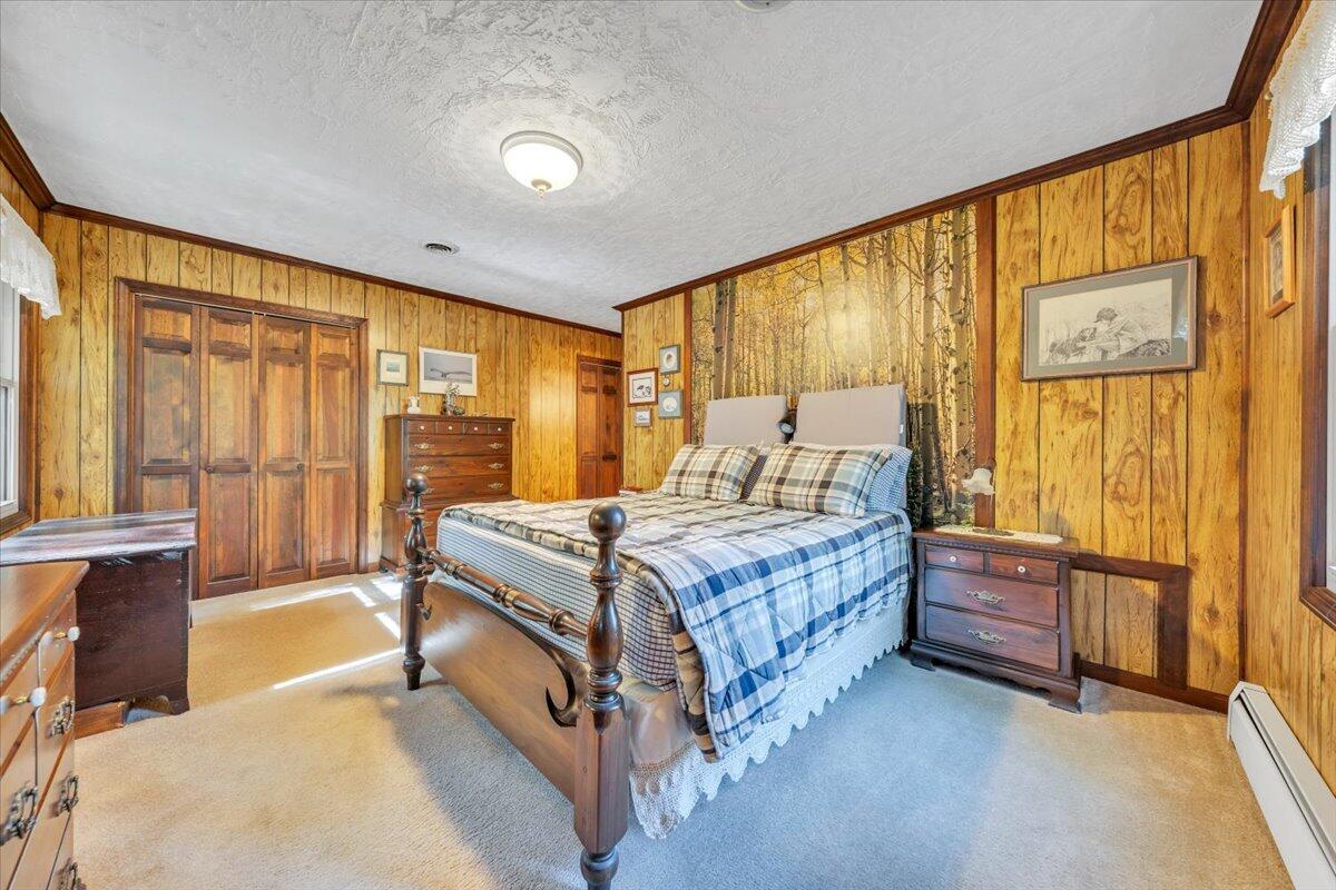 3878 Harborwood Road Salem, VA 24153 - Photo 29 of 60 a bedroom with a bed and wooden floor