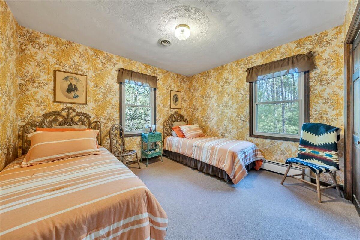 3878 Harborwood Road Salem, VA 24153 - Photo 34 of 60 a spacious bedroom with a bed and a dresser next to a window